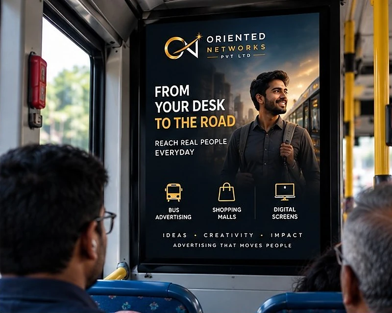 A portrait bus screen next to a window, showing the advertisement 'From your desk to the road'.