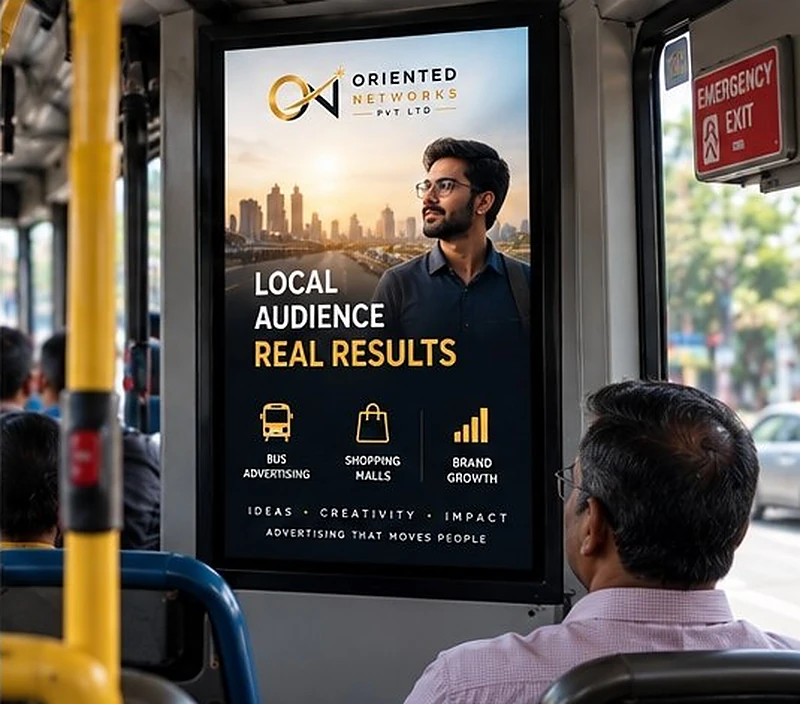 A portrait bus screen near the emergency exit showing 'Local audience, real results'.